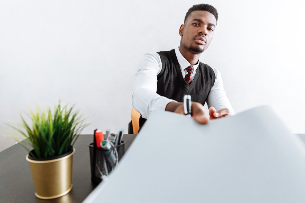 A public adjuster holding a paper